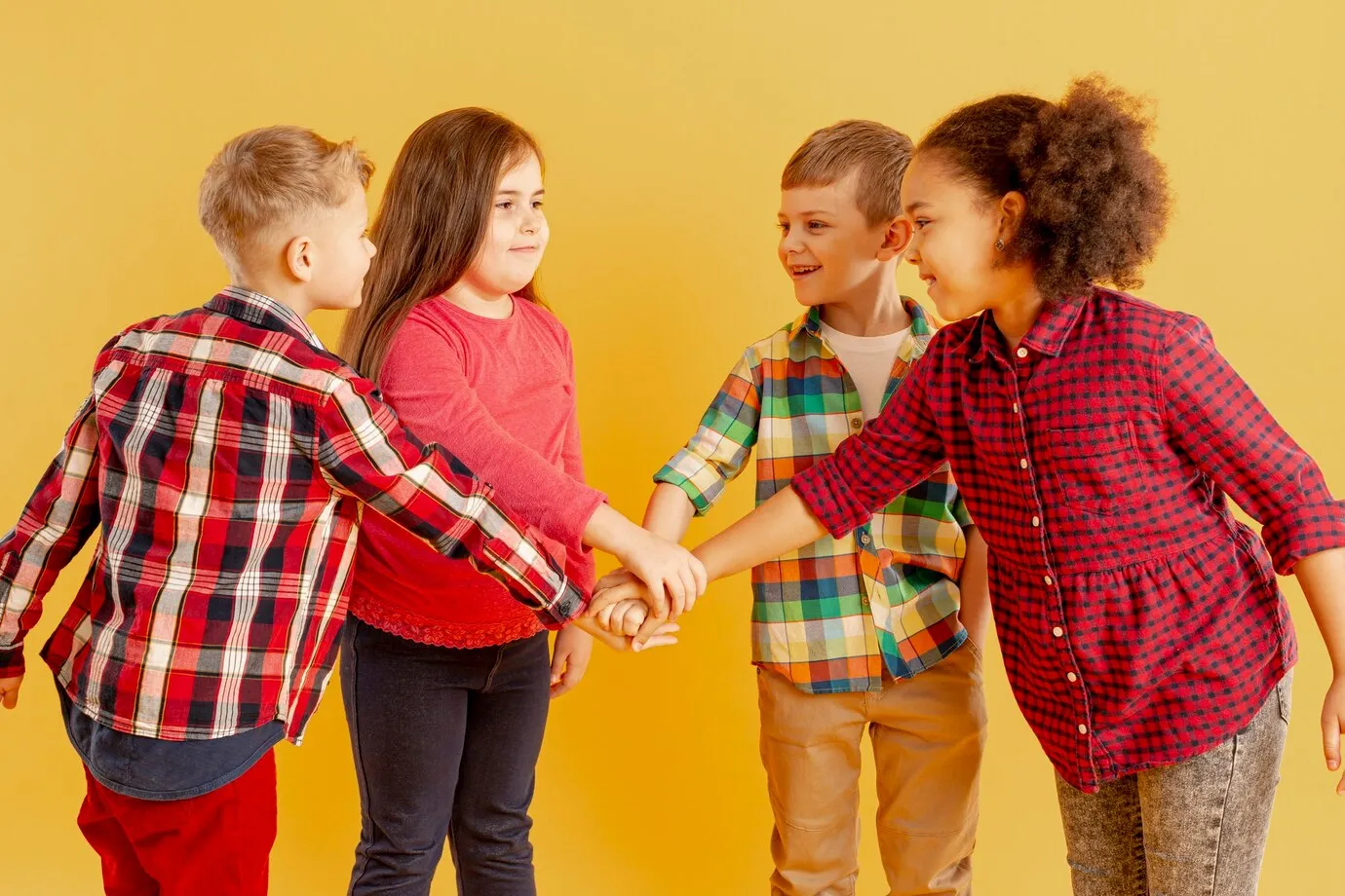 Children joining hands in a circle