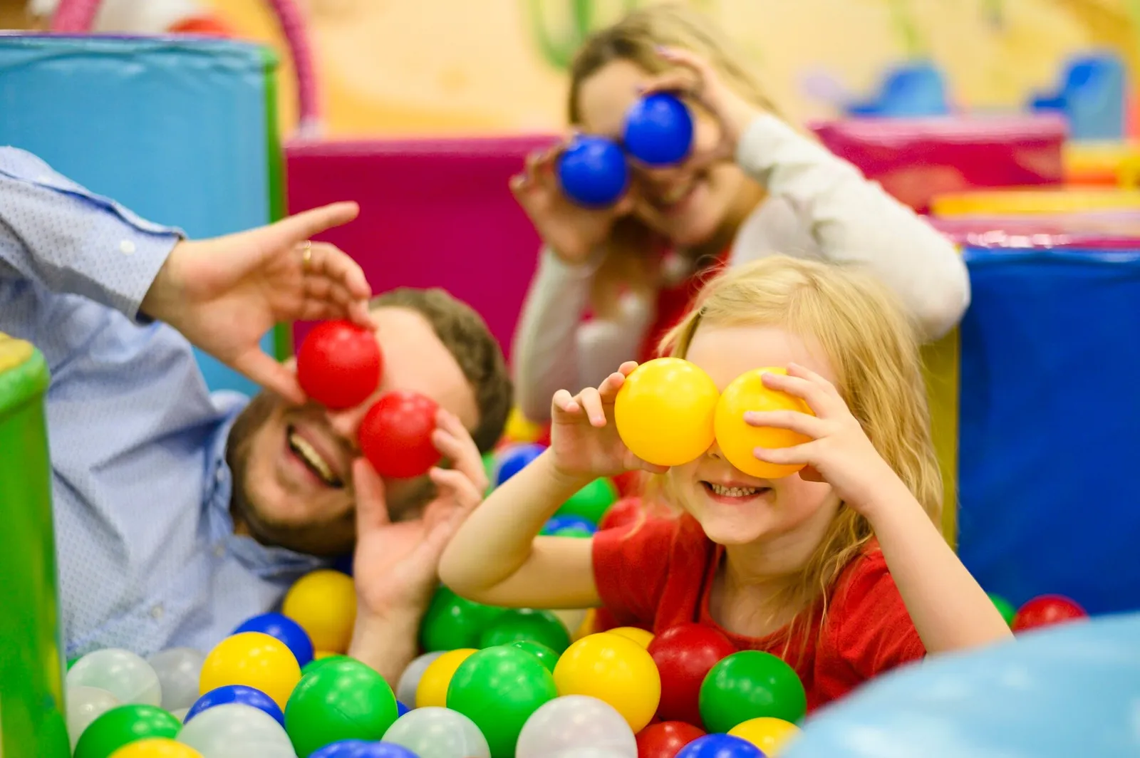 a group of people playing with balls